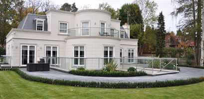 Wide Silver curved balustrades and Juliet balcony on beautiful white house