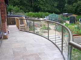 Bronze balcony 1 curved balustrade with stairs and gardens