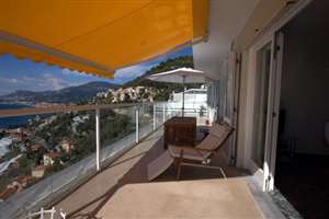 White balustrade with an amazing view and awning
