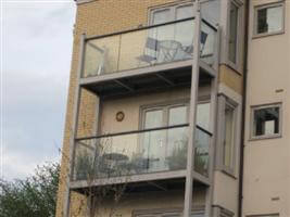 clear glass runs on balconies Hemel Hempstead, Hertfordshire