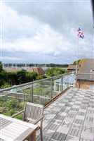 Royal Chrome balcony with the Union Jack flag flying