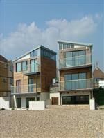 twin houses with glass balconies Lancing, West Sussex