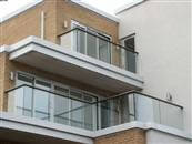 13-apartment building in Wimbledon, London is complemented perfectly by Balcony Sytems' Glass Balustrades and Juliet Balconies.