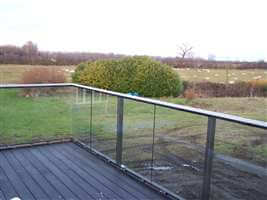 Royal Chrome balustrade looking out onto fields and sheep