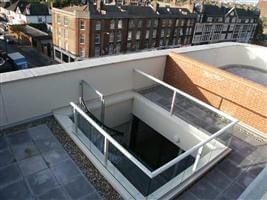 glass balcony on void london