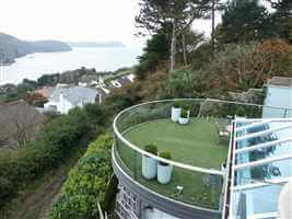 View down the hill to the water from Curved Royal Chrome balcony