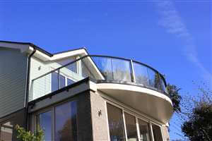 Curved balustrade with Royal Chrome handrails and blue sky