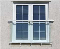 White Juliet balcony with clear glass