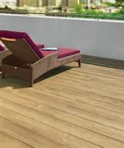 Composite Decking Enhanced Grain Coppered with sun lounger