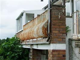 rusting balcony railing
