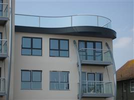Curved and straight Royal Chrome balconies on the coast