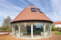 A whopping 10 metres of Curved Glass Patio Door makes huge statement on Nottinghamshire home