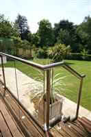 Royal Chrome balustrade on balcony and stairs to pretty garden