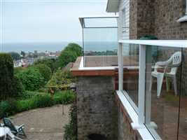 Side on shot of white balustrading showing the scenic view