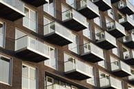 377 clear custom glass, structural balconies in Baltimore Wharf, London docklands, a problem solved by Balcony Systems. 