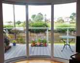 Curved Glass Sliding Doors make all the difference at refurbished South Wales property