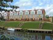 Exclusive townhouses overlooking the River Nene are enhanced by the added Clear Glass Juliet Balconies.