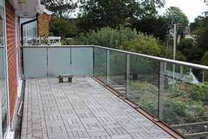 Royal Chrome balcony with frosted glass sides for privacy