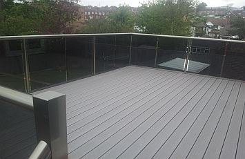royal chrome balustrade with tinted glass and composite decking