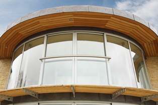 Curved Glass Windows with Curved Juliet balcony