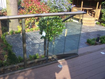 Glass Balustrade overlooking some beautiful shrubs and topiaries