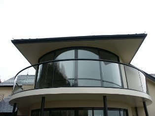 Curved Sliding Doors with curved glass balustrade