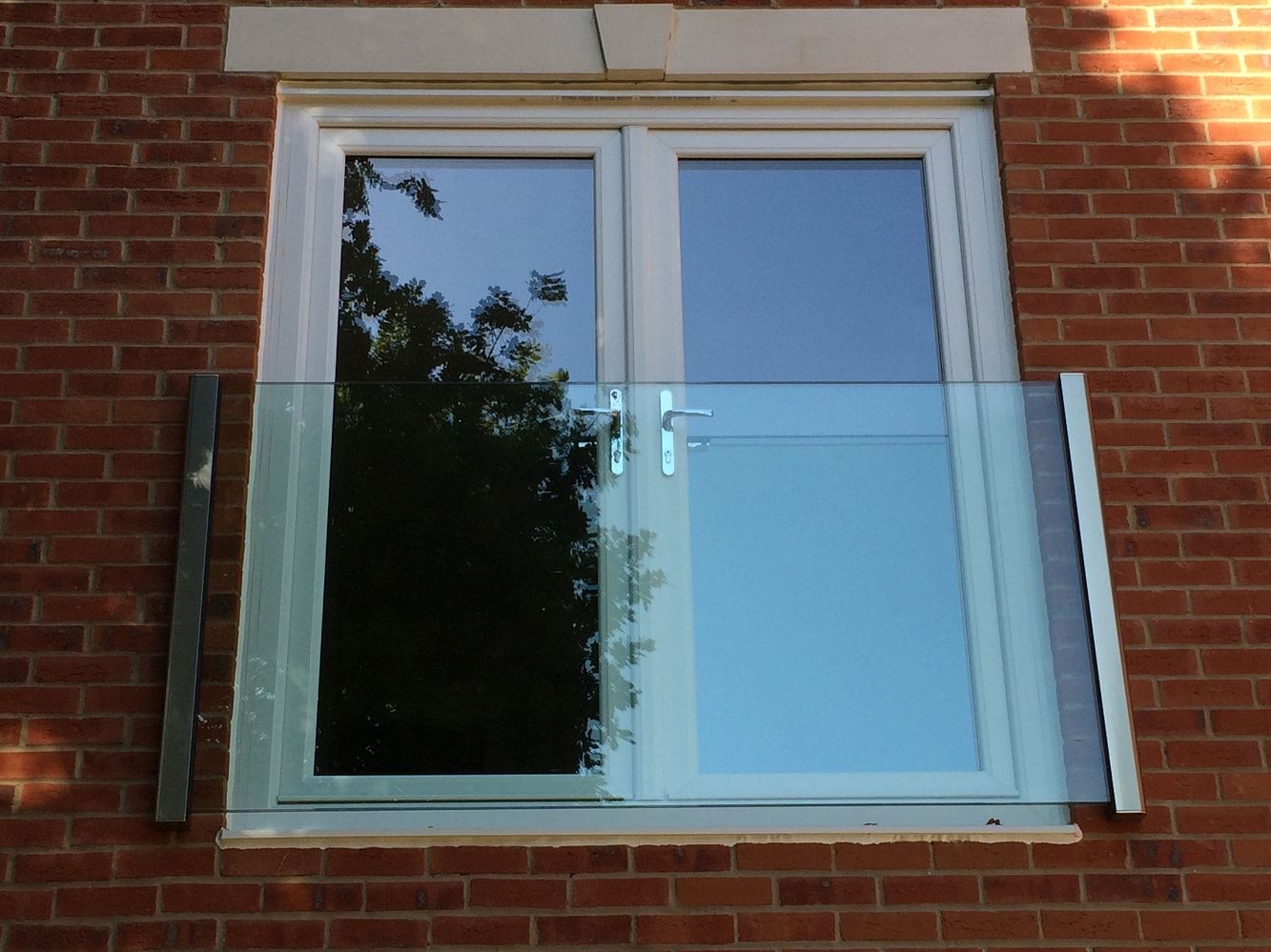 Frameless Juliet Balcony 2180mm wide in Royal Chrome