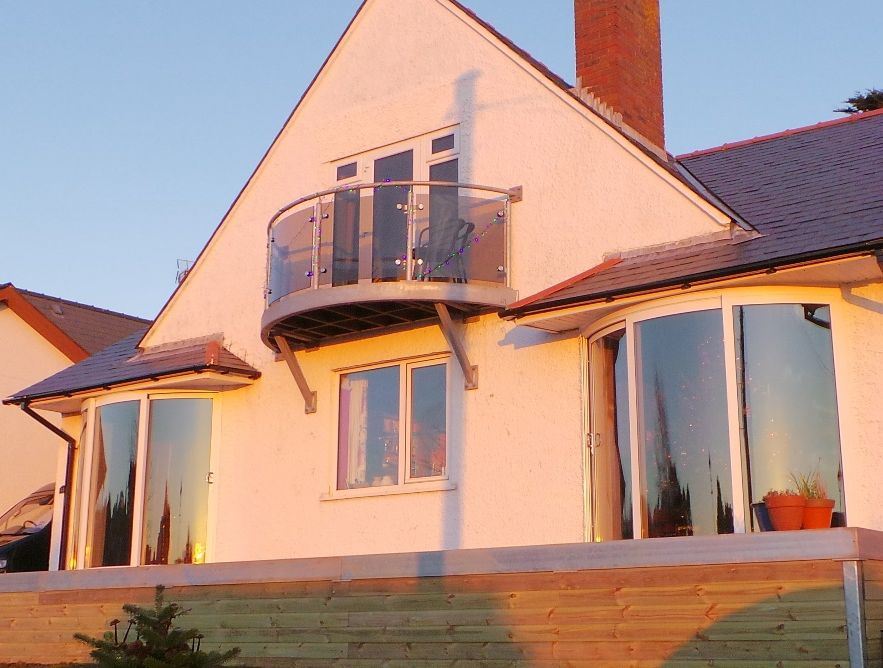 curved glass door in wales front view