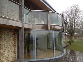 Curved Glass Sliding Doors and banister