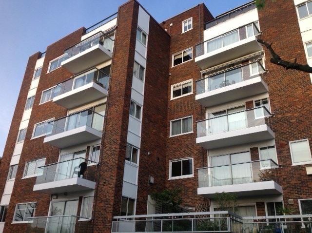 Glass Balustrades replace wooden balconies