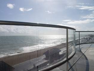 Curved Glass Balcony by the sea